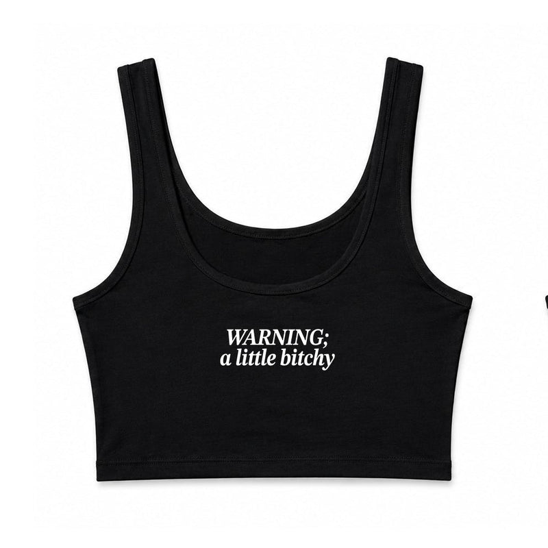 Two black scoop-neck crop tank tops shown flat against a white background, displaying the front and back views. The front features the white text 'hot girls love country' on the left chest, and the back features a small white 'TBS' logo on the upper right chest.
