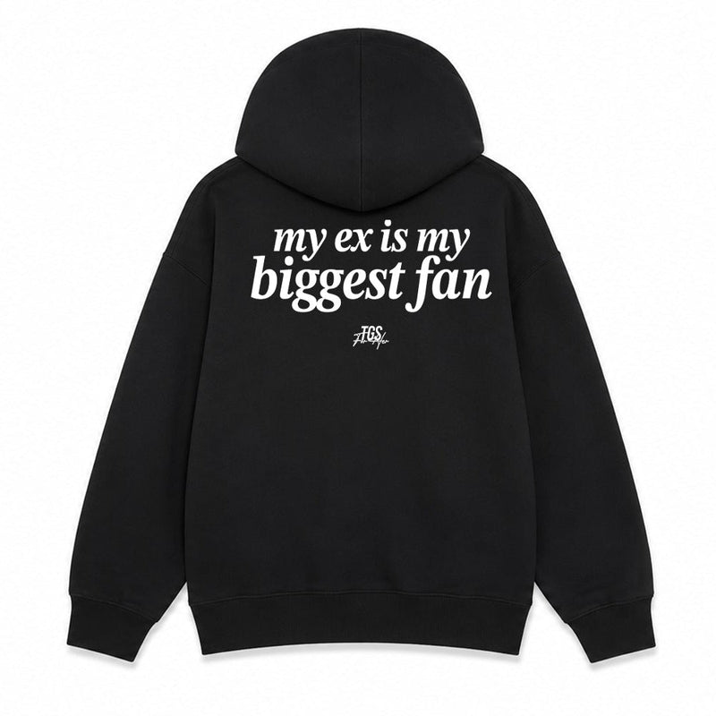 A black pullover hoodie shown from both the front and back on a plain white background. The front has small white text on the left chest reading 'very ex is my biggest fan', and the back has larger white text reading 'my ex is my biggest fan' with a small black graphic below.