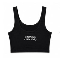 Two black scoop-neck crop tank tops shown flat against a white background, displaying the front and back views. The front features the white text 'hot girls love country' on the left chest, and the back features a small white 'TBS' logo on the upper right chest.