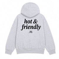 A light heather gray pullover hoodie shown from both the front and back. The front features a small black 'hot & friendly' logo on the left chest, and the back features a larger matching black logo print.